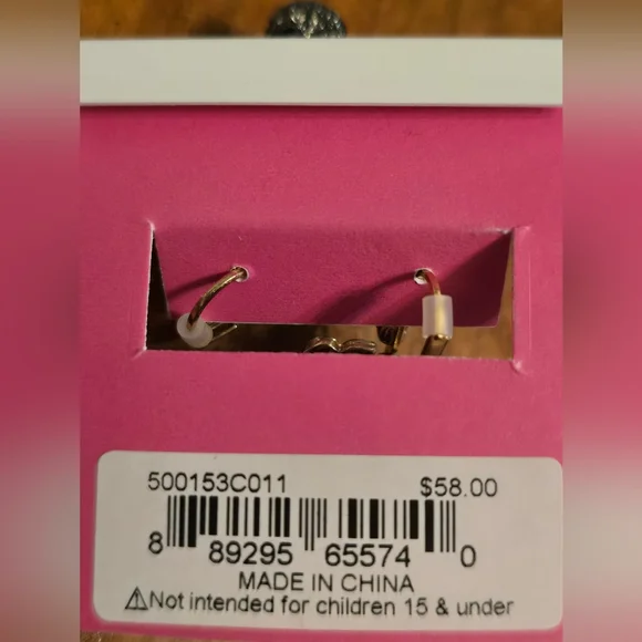 Elegant Skull Earrings with Butterfly Accents - Picture 4 of 4